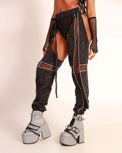 Chaps with silver reflective stripes and fishnet panels